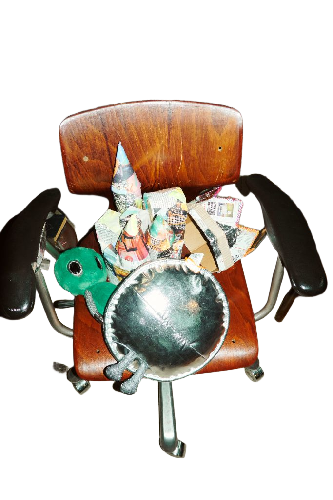 Handmade objects arranged on a vintage wooden chair